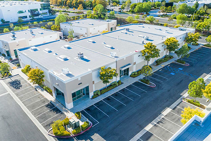 Commercial property requiring remote surveillance coverage