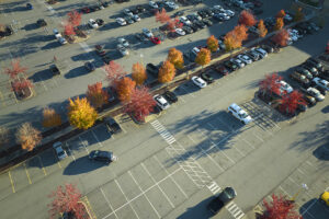 top view of many cars parked on a parking lot in f 2024 12 07 03 59 48 utc