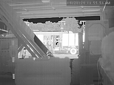 Thermal surveillance view showing heat signatures